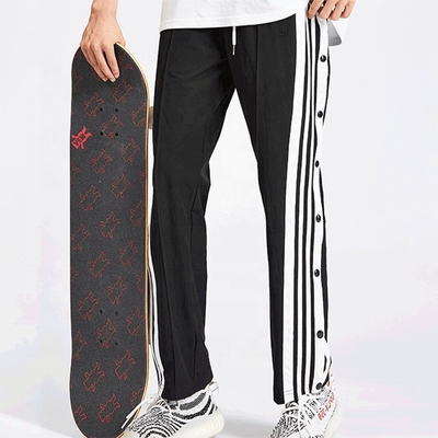 comprare Pantaloni da skateboard per uomini custom Street Hip Hop traspiranti con strisce laterale e bottoni online manufacture
